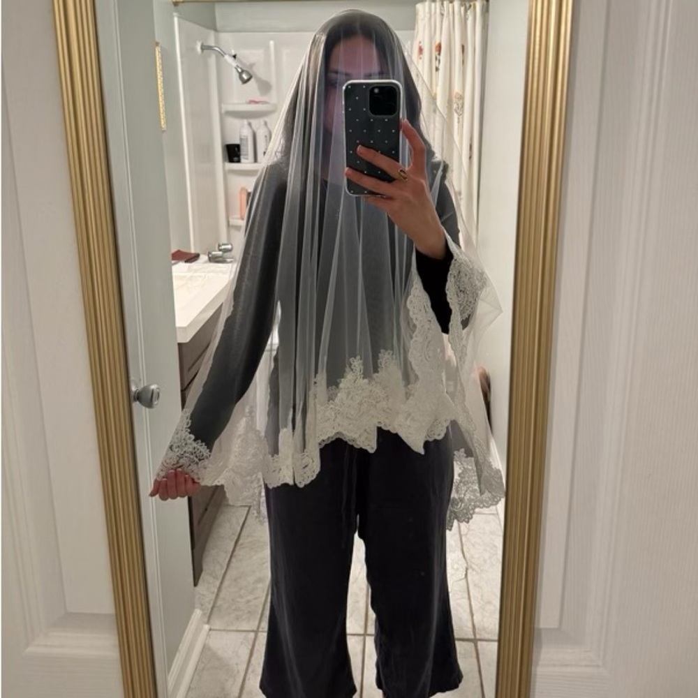 Custom made wedding veil. Never used.